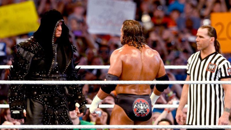 The Game and The Undertaker faced off at WrestleMania three times.