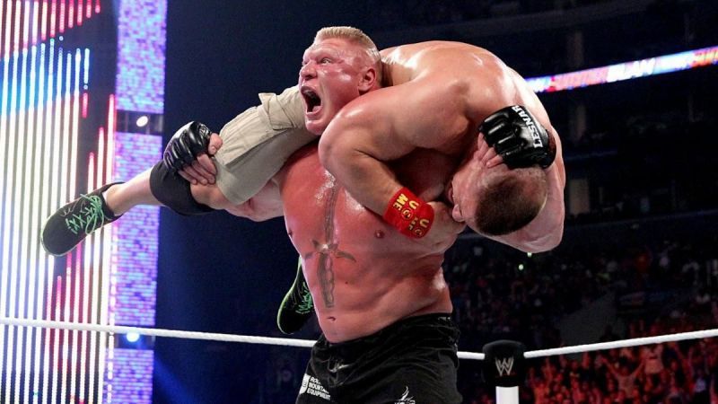 The Beast Incarnate Brock Lesnar hefts John Cena onto his shoulders for an F5 at SummerSlam 2014
