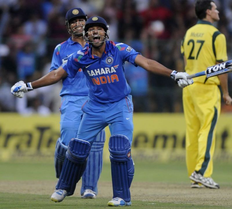 Rohit celebrates