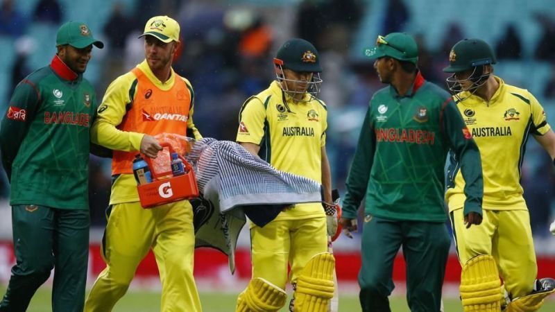 Dejected Australians walk off after rain interrupted play