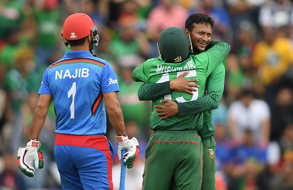 Bangladesh&#039;s two pillars, Shakib Al Hasan and Mushfiqur Rahim celebrating Najibullah Zadran&#039;s dismissal