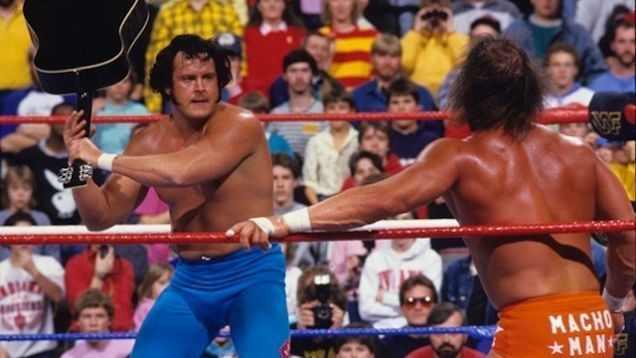 Honky Tonk Man prepares to way lay Randy Savage with his signature guitar.