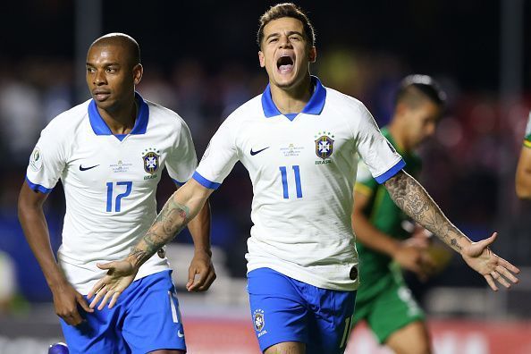 Philippe Coutinho and Fernandinho rejoice after scoring against Bolivia Felipe Luis was a constant threat down the left side of Brazil&#039;s attack