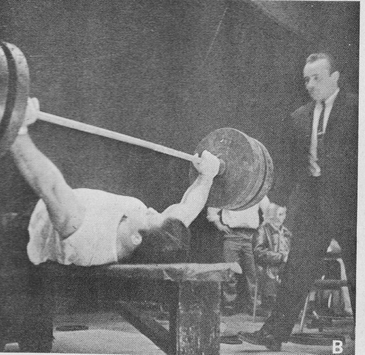 A young Bruno Sammartino attempting a massive bench press.