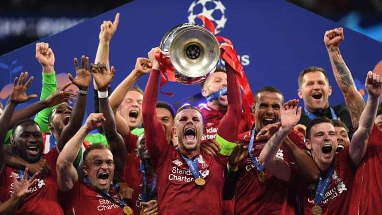 Liverpool players celebrating their triumph