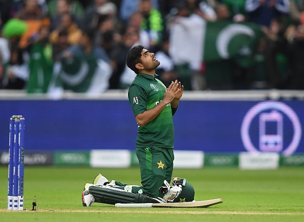 Babar Azam celebrates a well-crafted century on Wednesday.