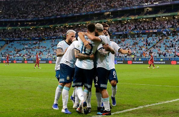 Argentina rejoice after clinching a 2-0 win over Qatar