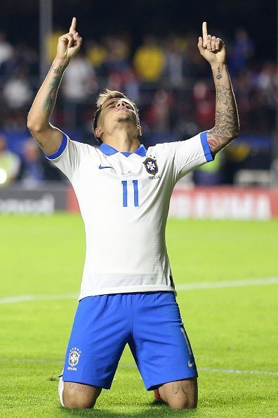 Coutinho celebrating his brace against Bolivia