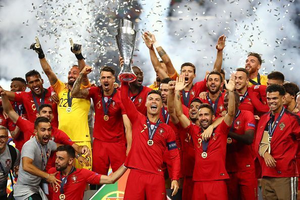 Portugal captain Cristiano Ronaldo lifts the Nations League trophy aloft after their 1-0 win over Holland