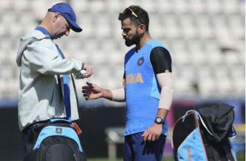 Virat Kohli and Patrick Farhart