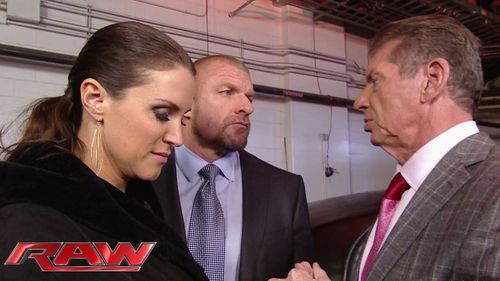 Triple H, Stephanie McMahon, and Vince McMahon