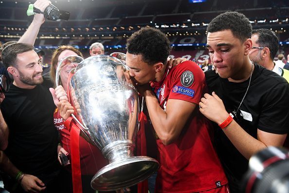 Trent celebrates with family and friends after Liverpool secured their sixth Champions League trophy