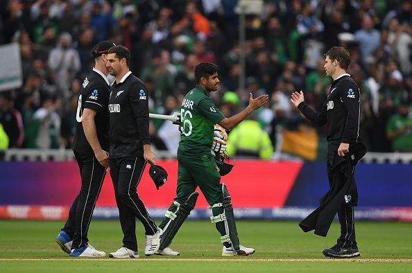 Babar Azam shaking hands with the New Zealand players after posting a comfortable win