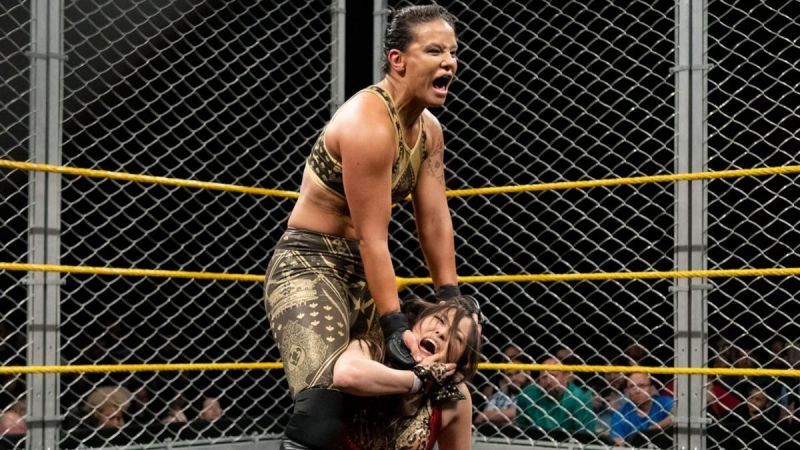 Shayna Baszler applies a painful Reverse Chinlock on Io Shirai during their Steel Cage match on NXT.