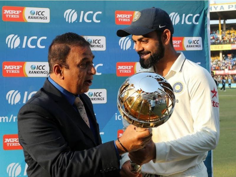 Virat Kohli with the Test mace