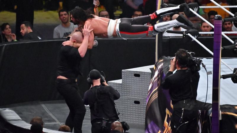 Seth Rollins hits a suicide dive