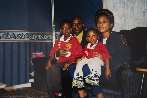 A picture of young Aaron (sitting on his mum&#039;s lap) wearing Man Utd red has been doing the rounds recently