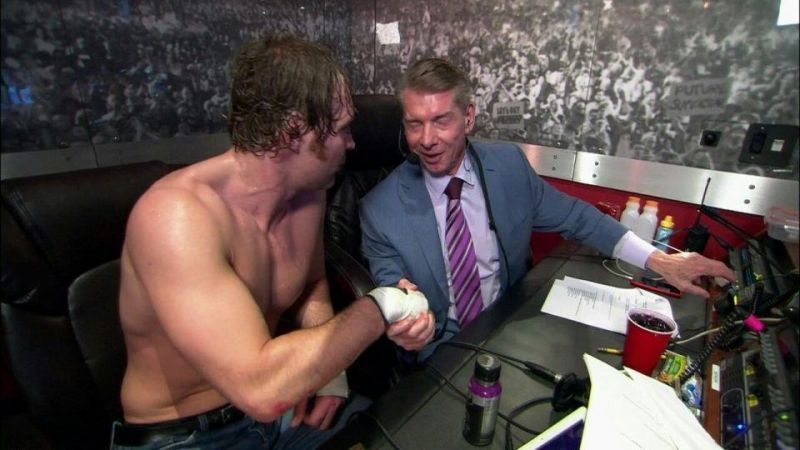 Dean Ambrose and Vince McMahon shaking hands