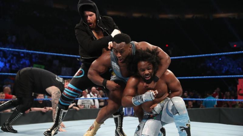 Sami Zayn attacking Big E and Xavier Woods