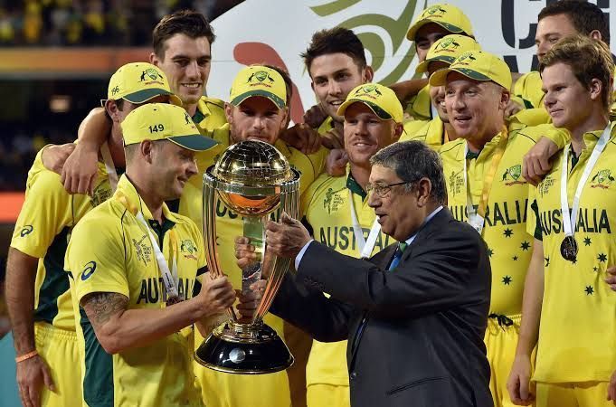 George Bailey and the Australian team posing with the World Cup trophy