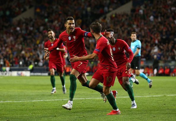 Portugal players wheel away to celebrate with talisman Ronaldo after his hat-trick in their semi-final win