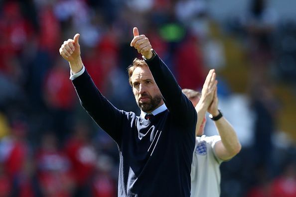 Gareth Southgate salutes the England supporters after beating Switzerland on penalties