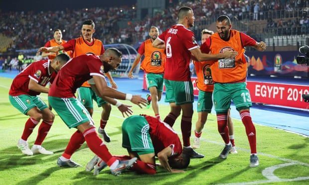 Morocco celebrates an automatic qualification into the knockout stages.