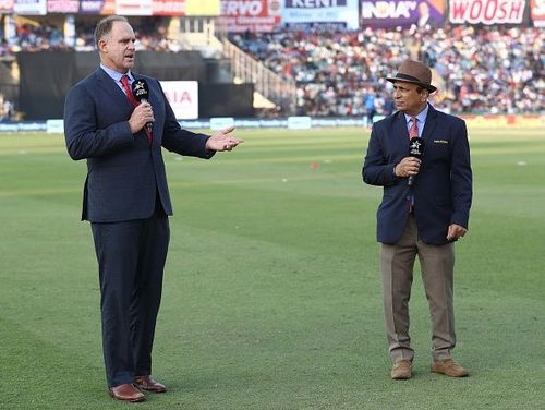 Sunil Gavaskar (right).