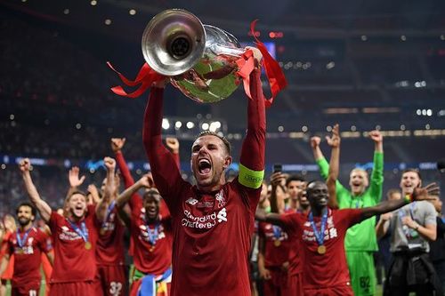 Jordan Henderson lifting Champions League trophy