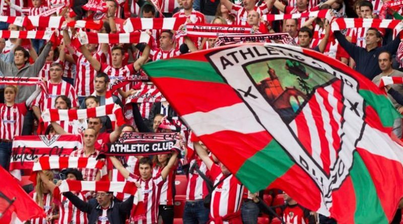 The Bilbao fans proudly hoist the Basque colours. (Image Source: FourFourTwo)