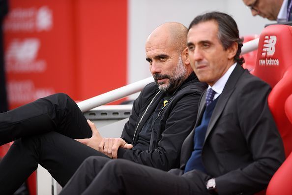 Manel Estiarte in the dugout beside Pep Guardiola