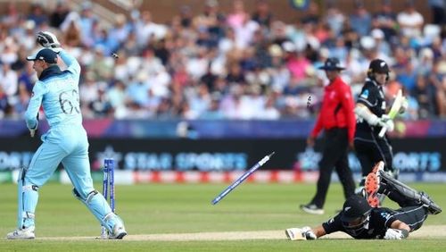 Ross Taylor on the floor as Buttler breaks the stumps