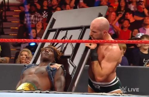 Cesaro takes out a table from under the ring, only to find Truth stuck to it