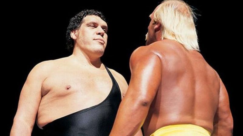 Andre the Giant looms over Hulk Hogan at Wrestlemania III