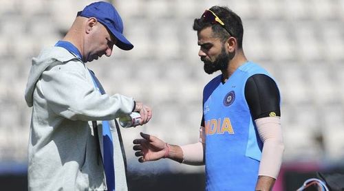 Patrick Farhart with Virat Kohli