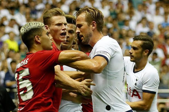 Manchester United youngsters Andreas Pereira and Scott McTominay holding their own against Tottenham&#039;s Harry Kane in a pre-season friendly