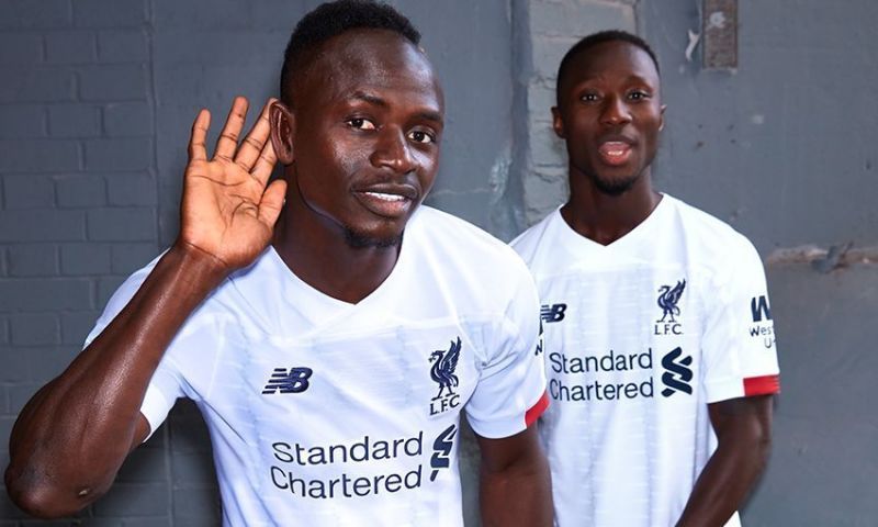 Sadio Man&eacute; (left) and Georgino Wijnaldum (right) wearing the new away jersey