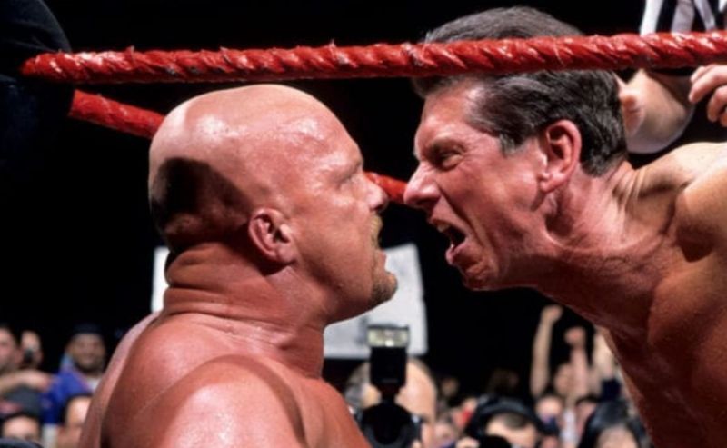 Mr. McMahon screams in the face of Stone Cold Steve Austin.