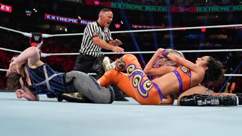 Bayley looking strong as she takes down two wrestlers with submission moves on Sunday