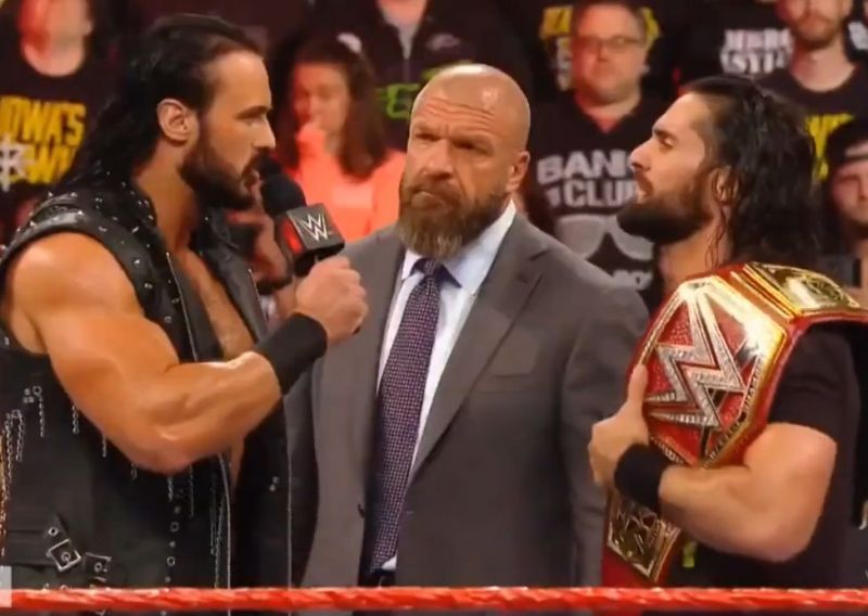 McIntyre with Triple H and Rollins