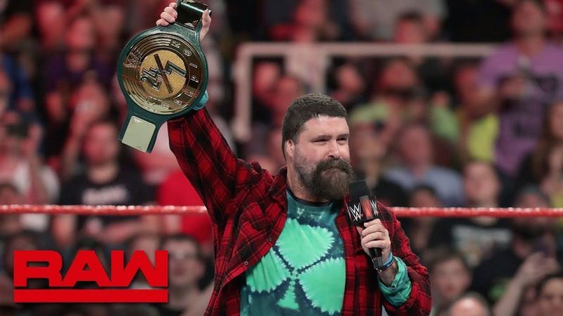 Mick Foley holding the 24/7 Title