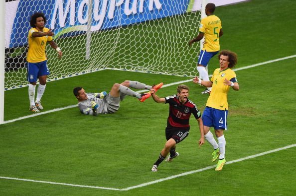 Muller celebrates the opener vs Brazil at Belo Horizonte in WC 2014 SF1.