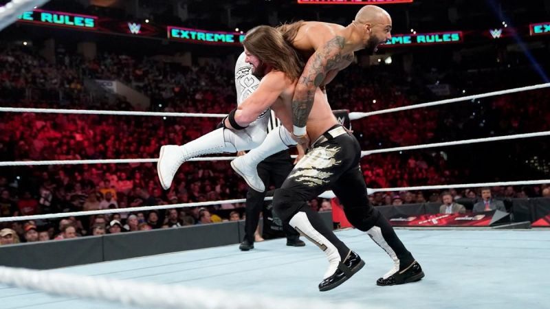 AJ Styles hoists Ricochet up