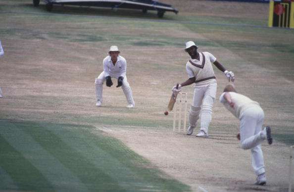 Malcolm Marshall tries to bat with one hand