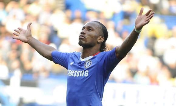 Drogba doing what he does best...