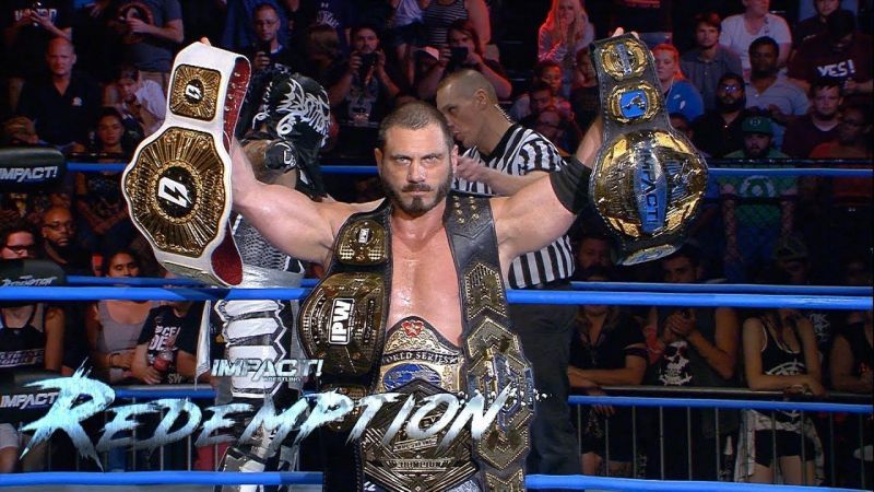 Aries, seen here with the six different championship belts he held at the same time, which spanned five different promotions across Europe, North America, and Australasia.