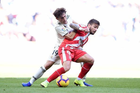 Christian Portu (in red) in Real Madrid CF v Girona FC - La Liga