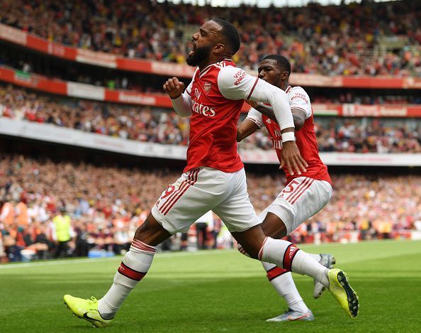 Alexander Lacazette celebrates his opener against Burnley at the Emirates Stadium