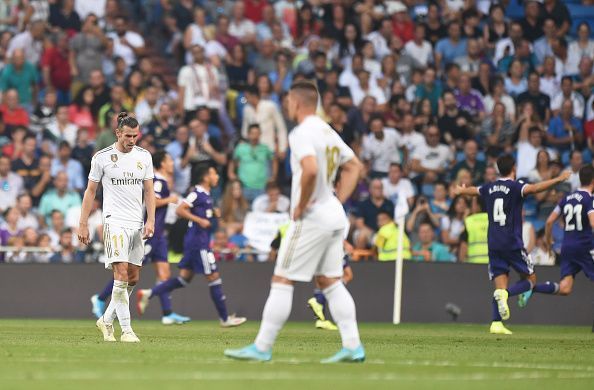 Real Madrid players look deflated after conceding a late equaliser to Valladolid