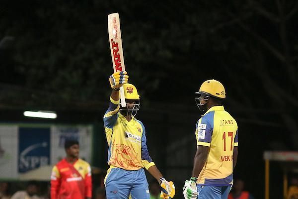 Hari Nishaanth of Dindigul Dragons lifts his bat high after scoring a half-century against VB Kanchi Veerans in the Sankar Cement TNPL 2019 at the NPR Cricket Ground, Natham, Dindigul